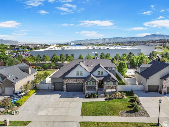 birds eye view of property featuring a mountain view