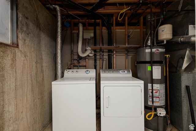 5550 Westside Dr, Kearns, UT 84118 - clothes washing area featuring washing machine and clothes dryer, laundry area, and water heater