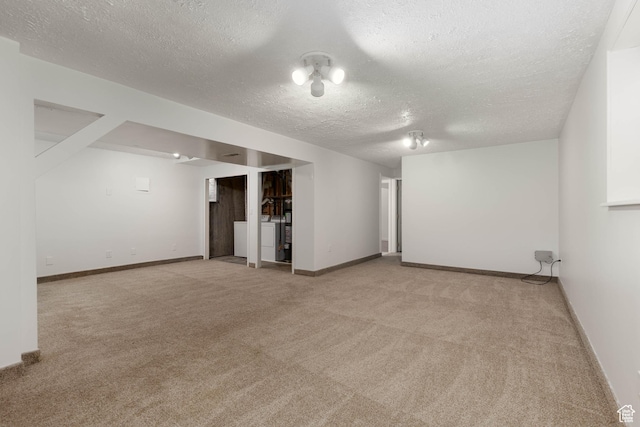 5550 Westside Dr, Kearns, UT 84118 - finished basement with baseboards, a textured ceiling, and light colored carpet