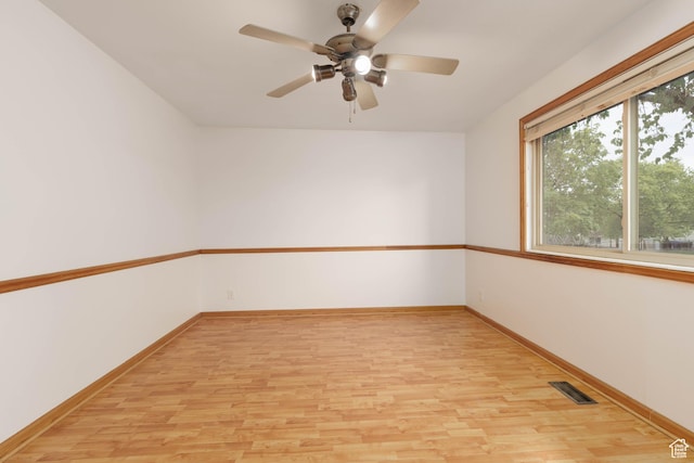 5550 Westside Dr, Kearns, UT 84118 - empty room featuring baseboards, ceiling fan, light wood finished floors, and visible vents