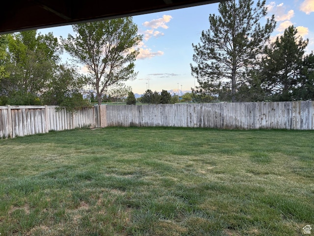 view of yard with fence
