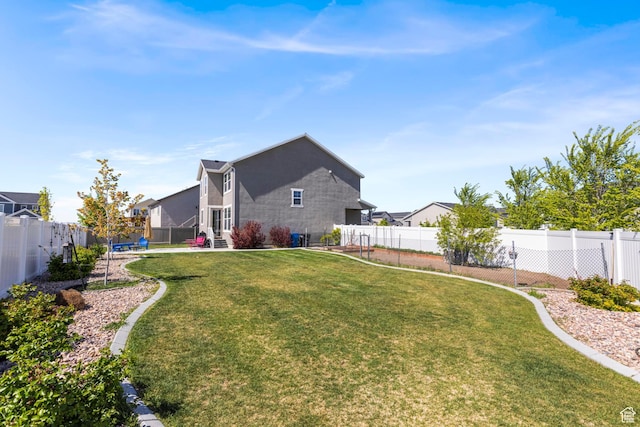 5829 N Goldfinch Ln, Stansbury Park, UT 84074 - view of yard featuring a fenced backyard