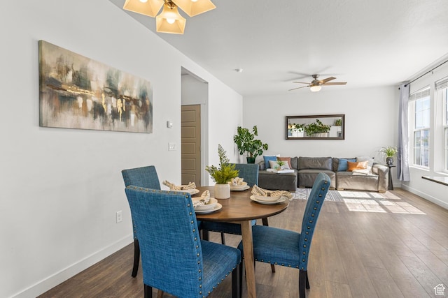 5829 N Goldfinch Ln, Stansbury Park, UT 84074 - dining space with baseboards, a ceiling fan, and wood finished floors