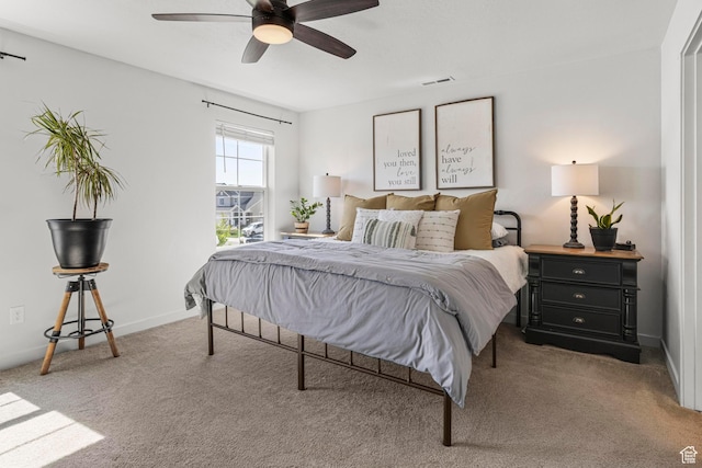 5829 N Goldfinch Ln, Stansbury Park, UT 84074 - bedroom featuring baseboards, visible vents, ceiling fan, and carpet