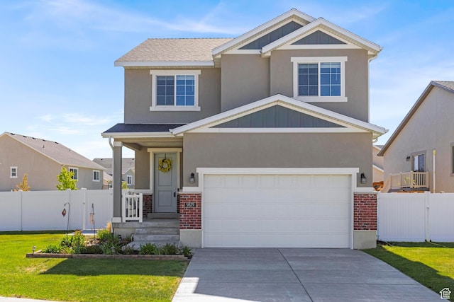 5829 N Goldfinch Ln, Stansbury Park, UT 84074 - view of front of house featuring a front lawn, fence, brick siding, concrete driveway, and an attached garage