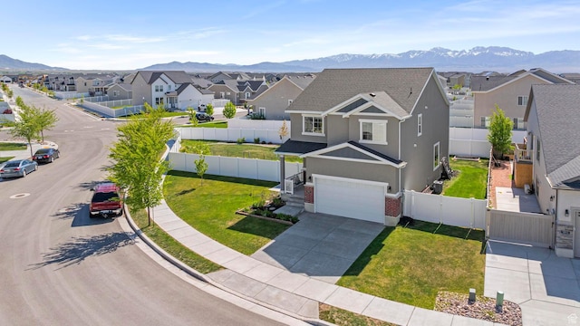 5829 N Goldfinch Ln, Stansbury Park, UT 84074 - birds eye view of property with a residential view and a mountain view