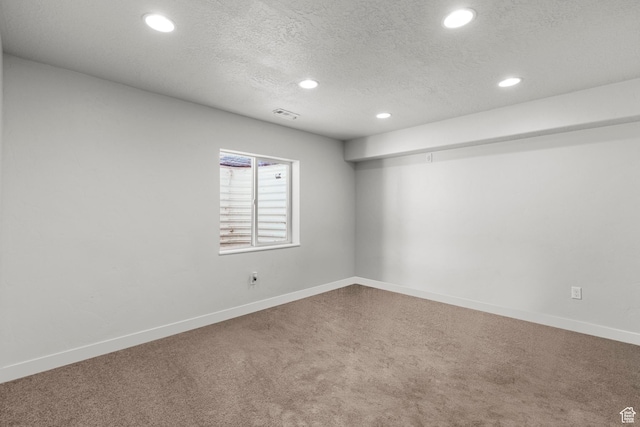 5829 N Goldfinch Ln, Stansbury Park, UT 84074 - basement with carpet floors, recessed lighting, baseboards, and a textured ceiling