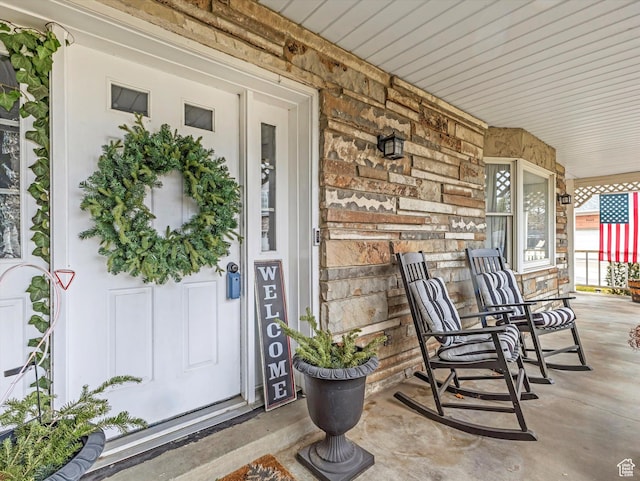 6439 S 1940 E, Murray, UT 84121 - entrance to property with a porch and stone siding