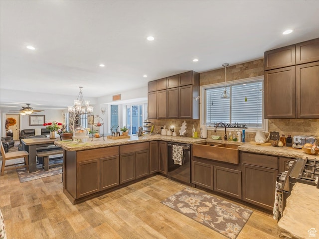 6439 S 1940 E, Murray, UT 84121 - kitchen with dishwashing machine, decorative backsplash, a peninsula, and a sink