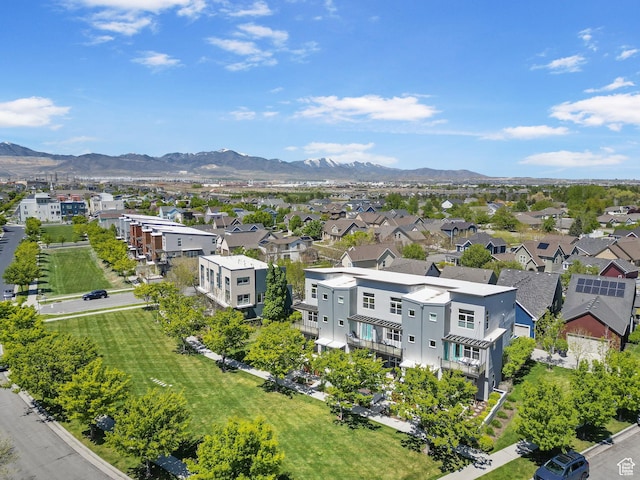 birds eye view of property featuring a mountain view and a residential view
