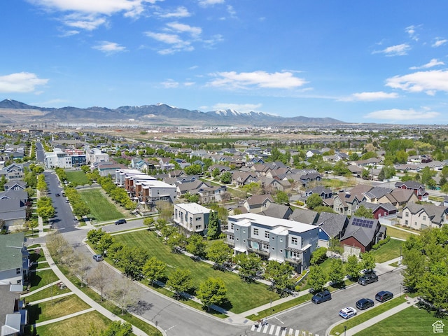 drone / aerial view with a residential view and a mountain view