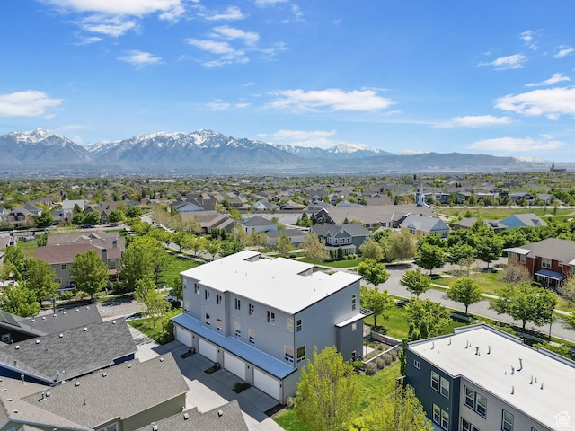drone / aerial view featuring a mountain view and a residential view