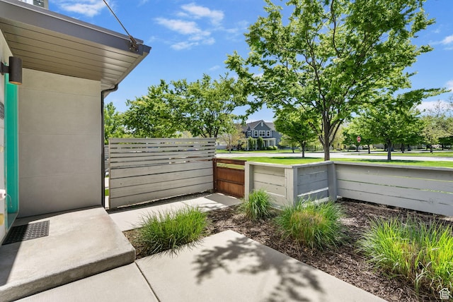 view of yard featuring a gate and fence