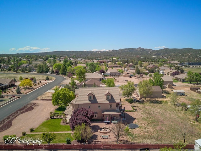 bird's eye view with a residential view and a mountain view