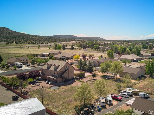 bird's eye view featuring a mountain view and a residential view