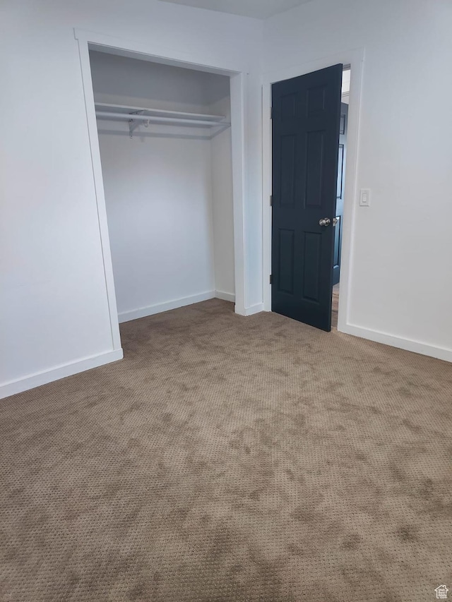 3112 S 3780 W, West Valley City, UT 84120 - unfurnished bedroom with carpet flooring, a closet, and baseboards