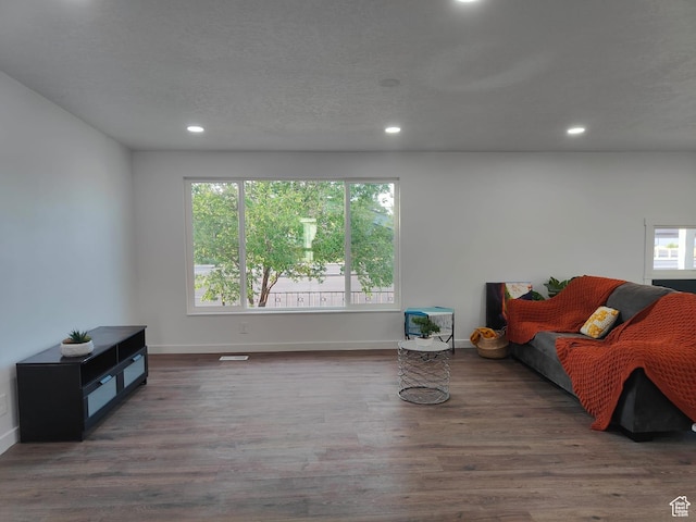 3112 S 3780 W, West Valley City, UT 84120 - living area with recessed lighting, wood finished floors, and baseboards