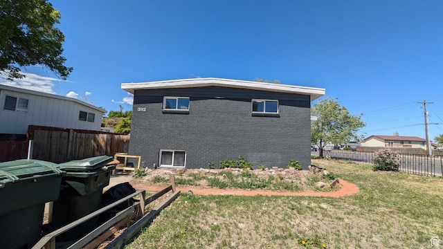 3112 S 3780 W, West Valley City, UT 84120 - back of property with brick siding and a garden