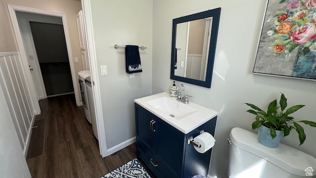 5026 S 1150 E, South Ogden, UT 84403 - bathroom featuring vanity, toilet, independent washer and dryer, and wood finished floors