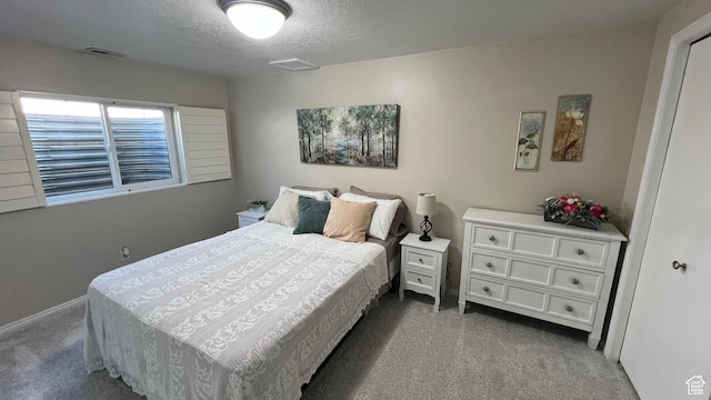 5026 S 1150 E, South Ogden, UT 84403 - bedroom featuring visible vents, a textured ceiling, and carpet