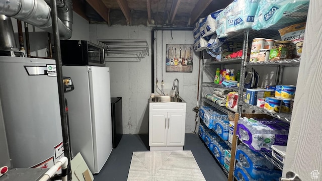 5026 S 1150 E, South Ogden, UT 84403 - basement featuring a sink and freestanding refrigerator
