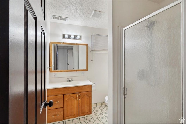 5782 Redwood Ln, South Ogden, UT 84403 - full bath featuring vanity, toilet, visible vents, and a stall shower