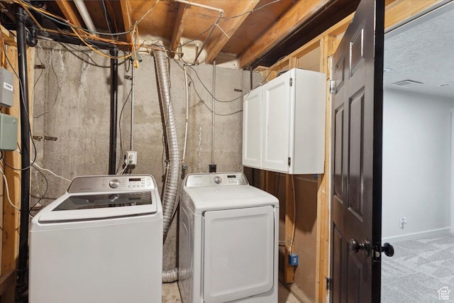 5782 Redwood Ln, South Ogden, UT 84403 - washroom with baseboards, washing machine and dryer, cabinet space, and visible vents