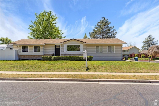 5782 Redwood Ln, South Ogden, UT 84403 - ranch-style home with fence and a front yard