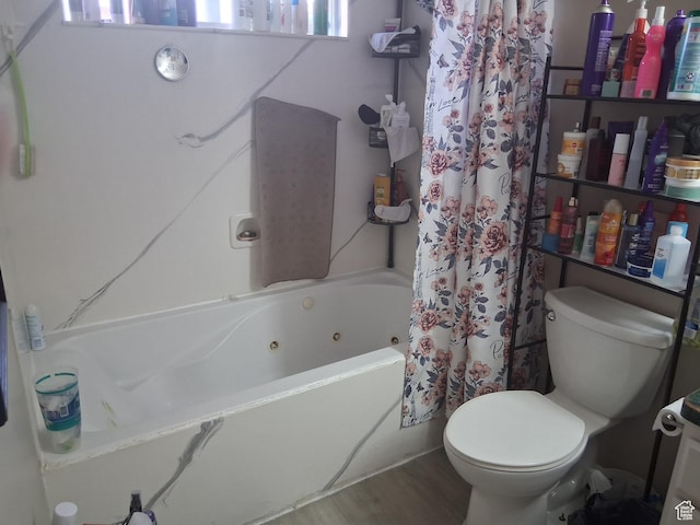 2434 W 2250 N, Clinton, UT 84015 - full bathroom with toilet, a combined bath / shower with jetted tub, and wood finished floors