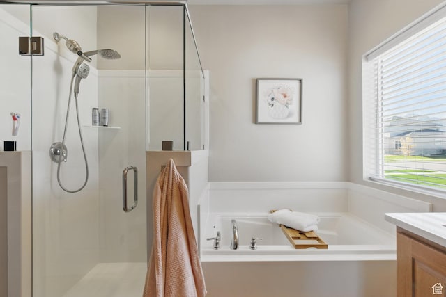 1147 N Carriage Ln, Spanish Fork, UT 84660 - bathroom with vanity, a garden tub, and a stall shower