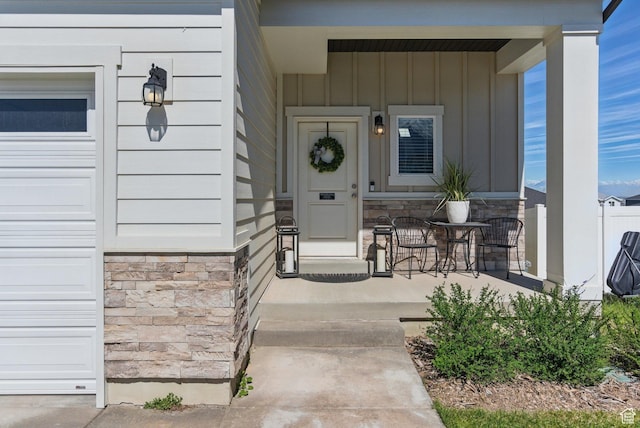 1147 N Carriage Ln, Spanish Fork, UT 84660 - entrance to property with board and batten siding, covered porch, and stone siding