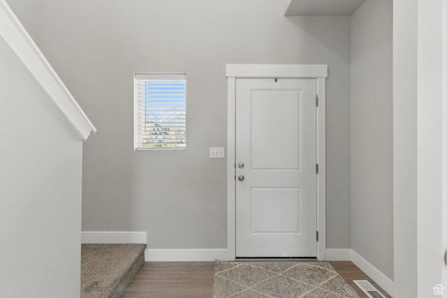 1147 N Carriage Ln, Spanish Fork, UT 84660 - foyer entrance featuring baseboards, visible vents, and wood finished floors