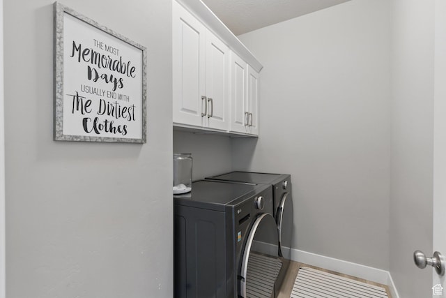 1147 N Carriage Ln, Spanish Fork, UT 84660 - washroom featuring washer and dryer, baseboards, tile patterned flooring, and cabinet space