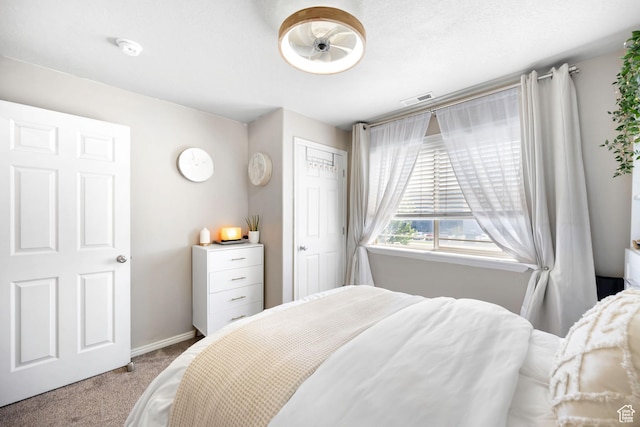929 W 670 S Unit 8, Pleasant Grove, UT 84062 - carpeted bedroom featuring visible vents, baseboards, and a closet