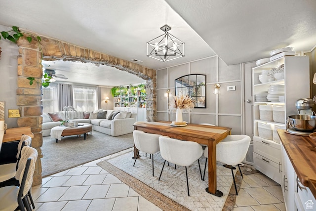 929 W 670 S Unit 8, Pleasant Grove, UT 84062 - dining room featuring visible vents, light tile patterned flooring, and a notable chandelier