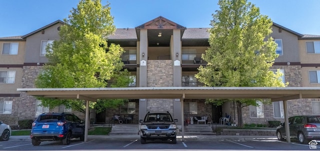 929 W 670 S Unit 8, Pleasant Grove, UT 84062 - view of property featuring covered parking