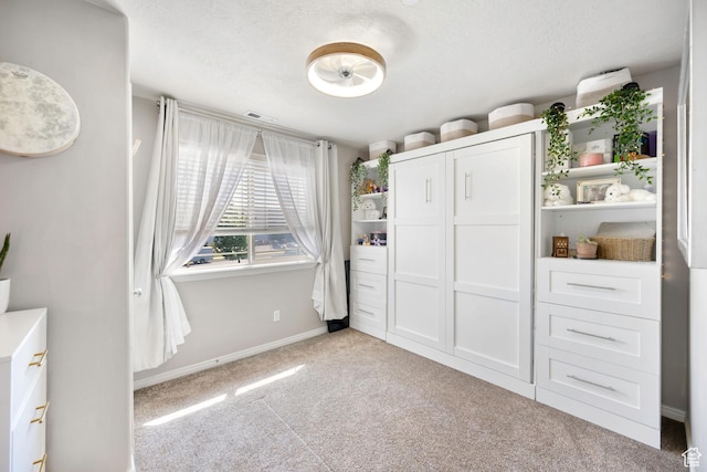 929 W 670 S Unit 8, Pleasant Grove, UT 84062 - unfurnished bedroom featuring light colored carpet, a textured ceiling, and baseboards