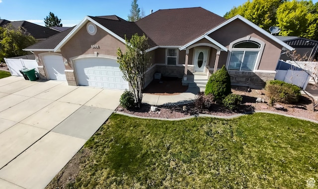 4902 W Pine Laurel Ln, West Jordan, UT 84081 - ranch-style home with an attached garage, stucco siding, driveway, and stone siding