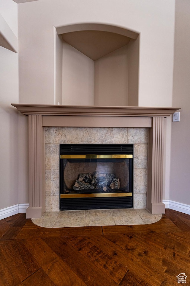 4902 W Pine Laurel Ln, West Jordan, UT 84081 - interior details with baseboards, wood finished floors, and a fireplace