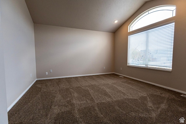 4902 W Pine Laurel Ln, West Jordan, UT 84081 - unfurnished room with baseboards, carpet flooring, lofted ceiling, and visible vents