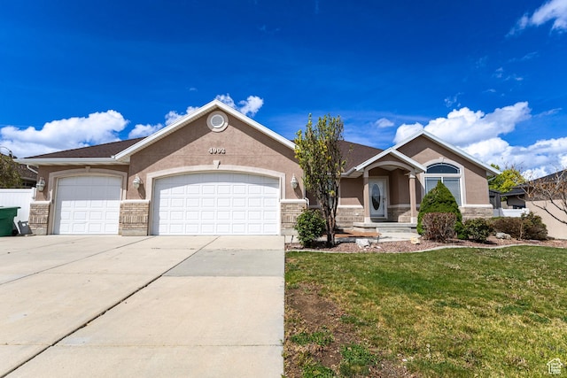 4902 W Pine Laurel Ln, West Jordan, UT 84081 - single story home featuring concrete driveway, stucco siding, stone siding, and a garage