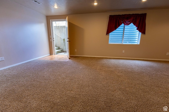 4902 W Pine Laurel Ln, West Jordan, UT 84081 - empty room with plenty of natural light, carpet flooring, recessed lighting, and visible vents
