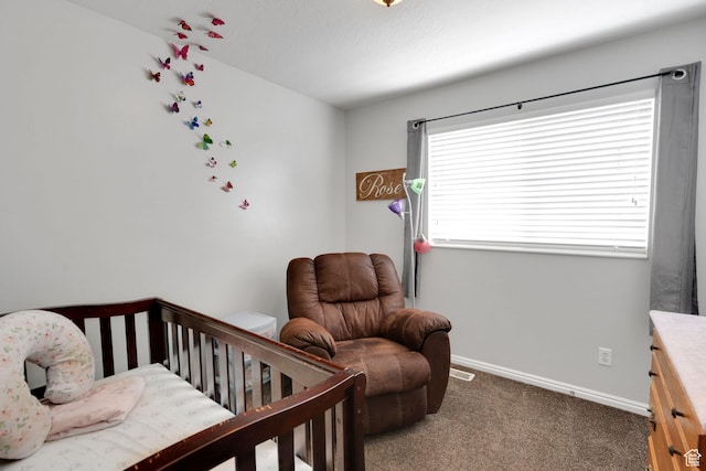 bedroom with baseboards and carpet