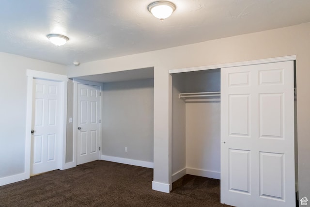 4866 W Spirit Lake Cir, Riverton, UT 84096 - unfurnished bedroom with baseboards, multiple closets, and carpet