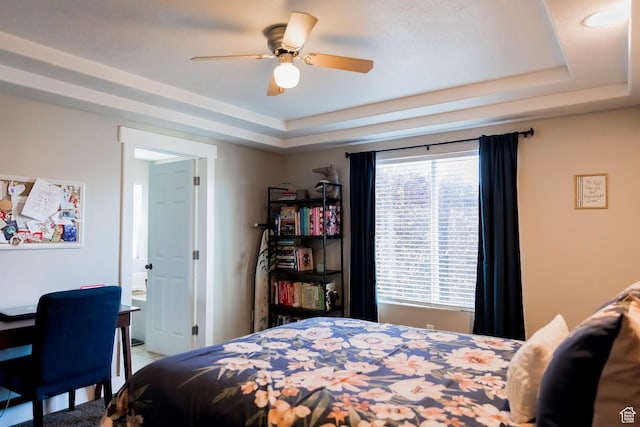 4866 W Spirit Lake Cir, Riverton, UT 84096 - bedroom featuring a ceiling fan and a tray ceiling