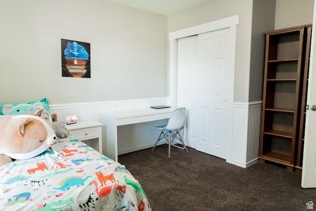 4866 W Spirit Lake Cir, Riverton, UT 84096 - bedroom featuring wainscoting and dark colored carpet