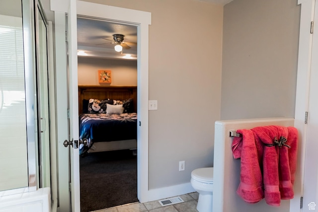 4866 W Spirit Lake Cir, Riverton, UT 84096 - bathroom featuring toilet, a ceiling fan, baseboards, ensuite bathroom, and visible vents