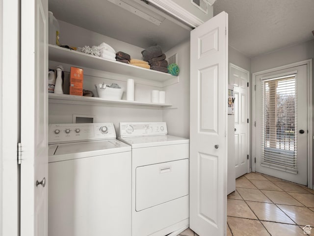426 E 400 S, American Fork, UT 84003 - clothes washing area with separate washer and dryer, laundry area, light tile patterned flooring, and visible vents