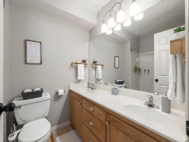 426 E 400 S, American Fork, UT 84003 - full bath featuring double vanity, toilet, baseboards, and a sink