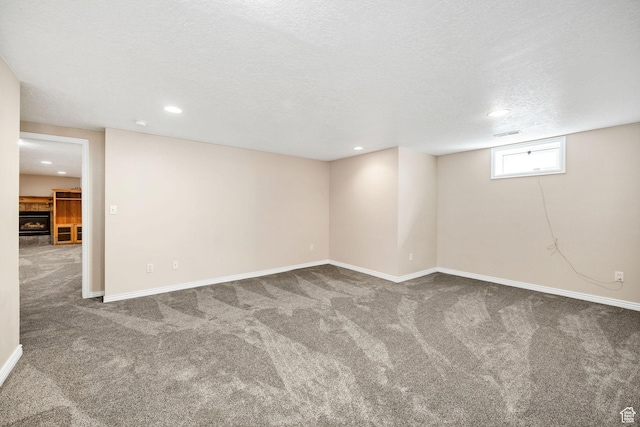 518 E Wendy Way S, Tremonton, UT 84337 - below grade area with recessed lighting, carpet flooring, baseboards, and a textured ceiling
